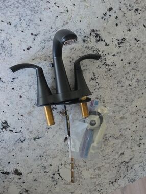 Matte Black Two-Handle Bathroom Faucet with Pop-Up Rod MOEN